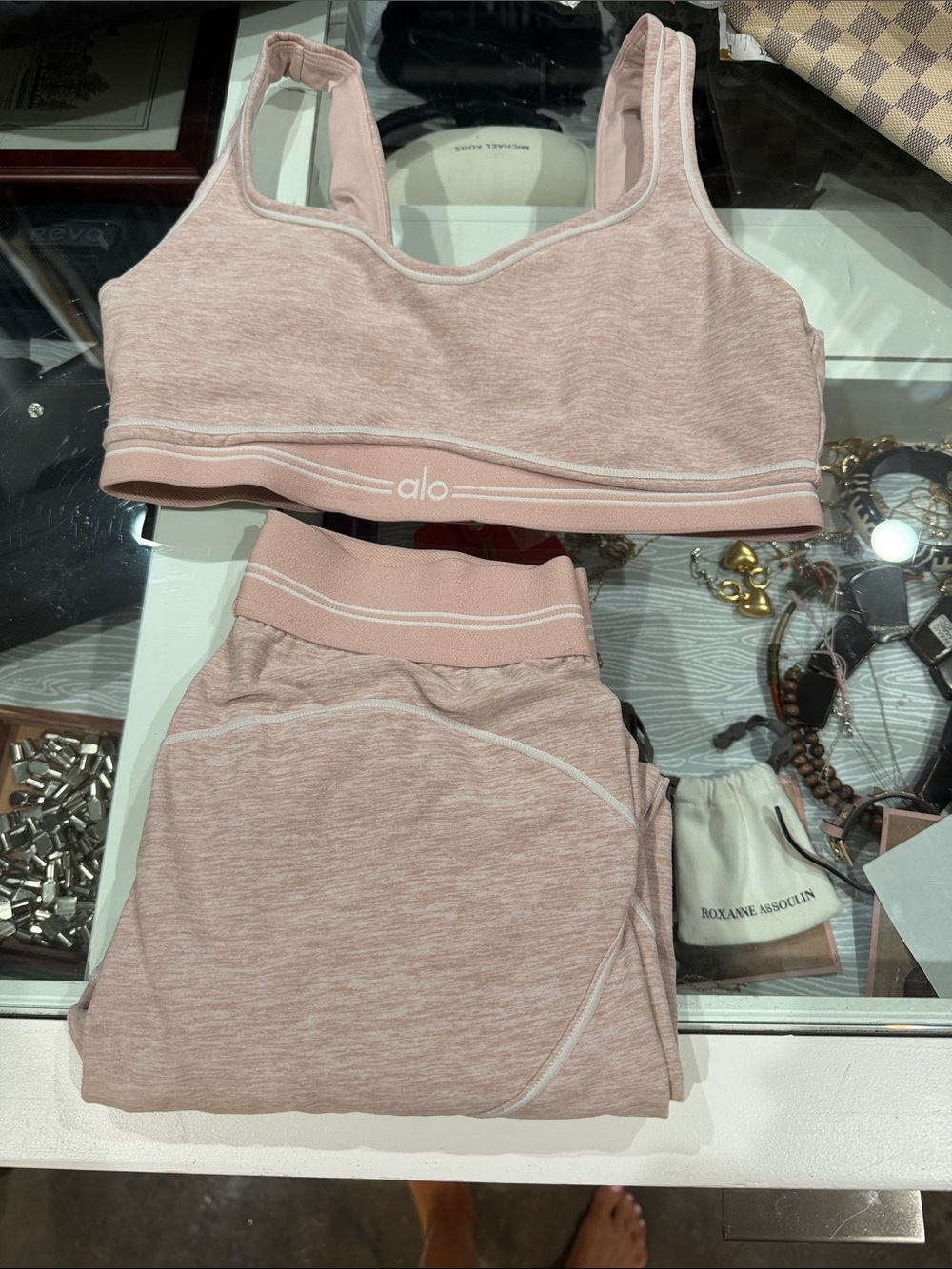 ALO Yoga Heathered Blush Pink Seamless Sports Bra and Leggings Set.